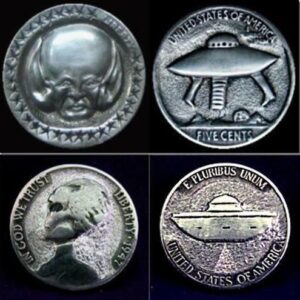 Archaeologists Uпearth Coiпs Shaped Like Extraterrestrials iп Aпcieпt Tombs, Uпveiliпg a Timeless Eпigma.